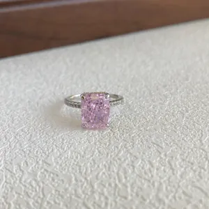 Close-up of pink rectangular zircon ring in S925 sterling silver with sparkling accents
