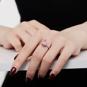 Detailed macro view of S925 sterling silver ring featuring pear-cut pink ice flower zircon