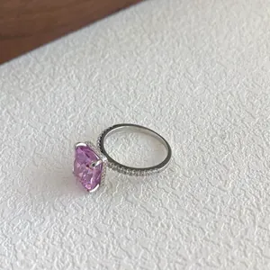 Detailed side view of S925 sterling silver ring featuring a square pink zircon stone