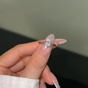 Detailed view of an S925 silver ring featuring a sparkling ice-flower cut zircon stone.