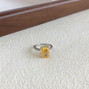 Detail view of S925 sterling silver ring with large radiant-cut yellow gemstone.