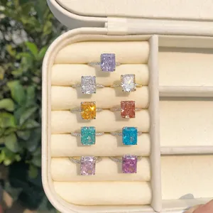 Colorful rectangular sterling silver rings with high-carbon diamonds in a jewelry box