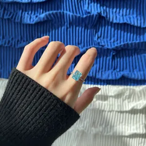 Close-up detail of S925 sterling silver ring with a square blue ice flower cut zircon