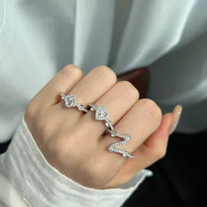 S925 sterling silver rings with heart and clover designs featuring clear zirconia stones.
