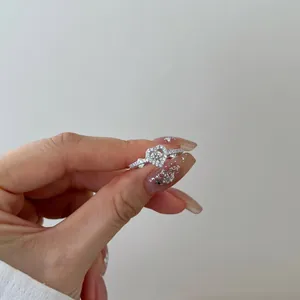 Detailed view of an S925 sterling silver heart ring with sparkling zircon stones