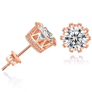 Detail showing rose gold crown stud earrings with sparkling round cubic zirconia stone.