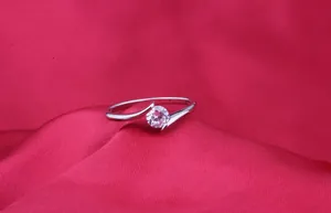 Elegant silver crossover ring with a brilliant round zircon stone for women jewelry