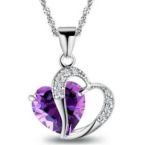 Detail showing a heart pendant necklace with faceted purple AAA cubic zirconia stone