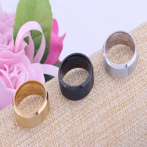 8mm brushed tungsten steel rings in black, gold, and silver finishes on textured fabric
