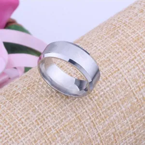 Close-up of 8mm silver tungsten steel ring with elegant brushed finish and polished edges