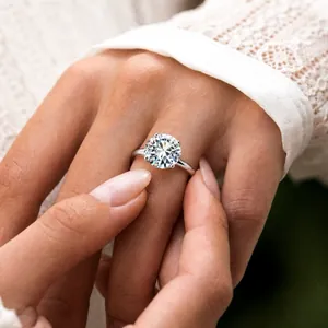 Close-up of S925 sterling silver ring featuring a 4-prong solitaire moissanite