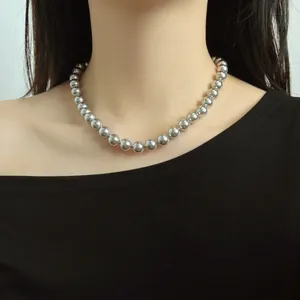 Model wearing a 10mm grey metallic pearl necklace made of S925 sterling silver beads.