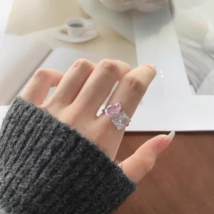 Detailed view of an elegant S925 silver ring featuring pink and clear ice flower cut CZ stones.