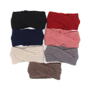 Detail view of seven colorful bohemian style knitted twist headbands for women