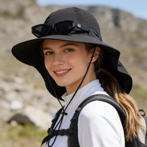 Close-up of a black outdoor sun hat with wide brim, neck flap, and breathable mesh