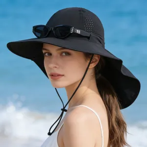 Detail shot of a black breathable mesh sun hat with neck protection for outdoor activities
