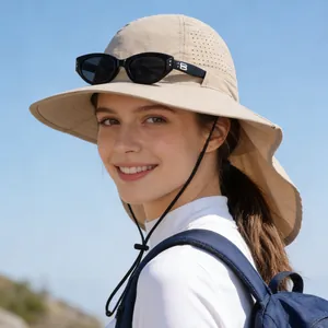 Detailed view of a beige breathable mesh sun hat with neck flap and black sunglasses.