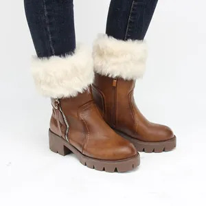 Soft faux fur boot cuffs for women, stylish warm leg warmers shown on leather boots