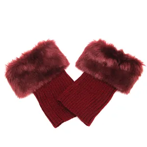 Detailed view of burgundy knit boot cuffs with soft faux fur trim for winter warmth
