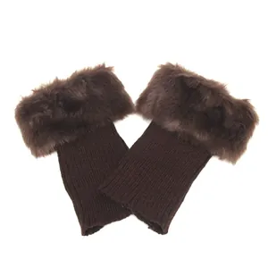 Detailed view of brown knitted boot cuffs featuring soft faux fur trim for winter warmth.