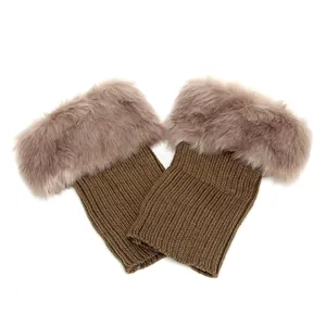 Short brown knitted boot cuffs featuring plush taupe faux fur trim for winter warmth.