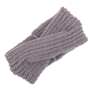 Detailed view of bohemian style hand-knitted gray wool headband with a twist design.
