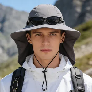 Close-up of a breathable grey sun hat with mesh vents and protective neck flap