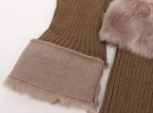 Close-up detail of knitted boot cuffs showing soft faux fur lining and texture