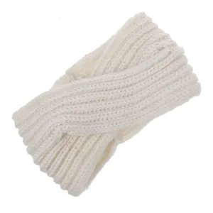 Detailed view of ivory knitted crossover headband showing intricate cable knit texture.