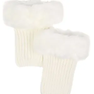 Elegant white knitted boot cuffs with plush faux fur trim for winter warmth.