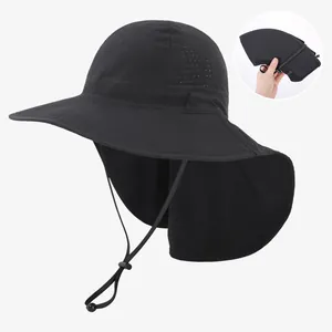 Detail view of a black breathable sun hat with neck flap showing its foldable design