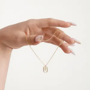 Elegant gold S925 sterling silver necklace with a sparkling micro-paved letter U pendant detail