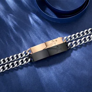Close-up detail of couple cross bracelets in premium 316L stainless steel finish
