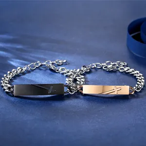 Close-up detail of 316L stainless steel cross bracelets for couples in black and rose gold.