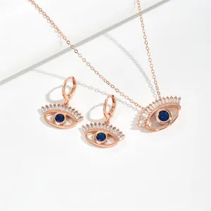 Elegante set di gioielli malocchio in oro rosa con collana e orecchini in zircone blu