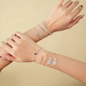 Elegant S925 sterling silver bracelet collection with floral and tennis designs