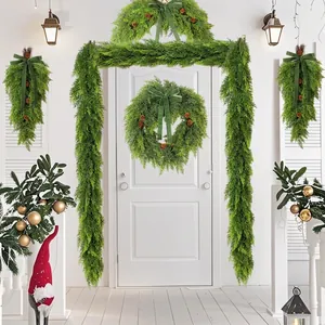 Outdoor Christmas display with lush faux cypress garlands and wreaths around a white door.