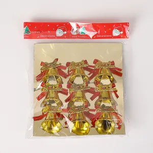 9-pack of gold Christmas bell ornaments with red bows and Merry Christmas text labels