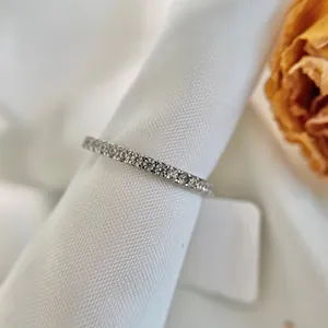 Macro detail of elegant S925 sterling silver eternity ring with clear cubic zirconia