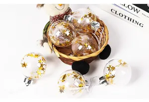 Juego de 6 bolas de Navidad transparentes de 8 cm con estrellas doradas y plumas
