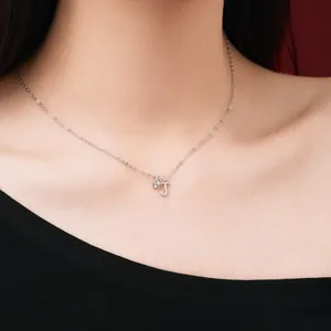 Close-up of S925 sterling silver necklace featuring a sparkling CZ and letter J pendant