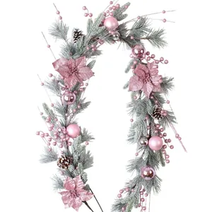 Elegant pink Christmas garland with poinsettias, berries and pine cones on white background