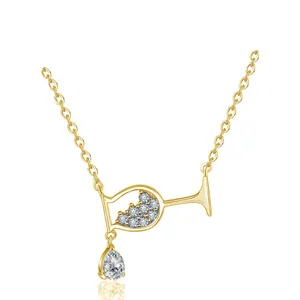Elegant gold-tone necklace with wine glass pendant featuring sparkling zircon water drop