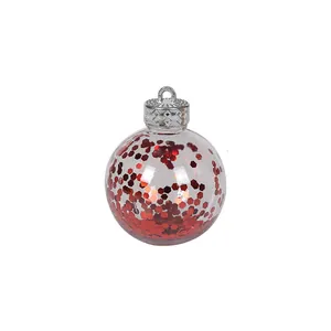 Clear Christmas bauble ornament with red sparkling hexagonal sequins inside for tree decoration