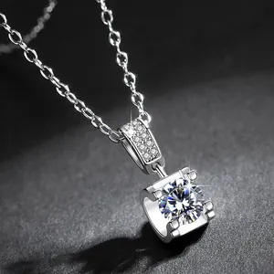 Detailed macro view showing a brilliant-cut sparkling stone in a bull head setting necklace