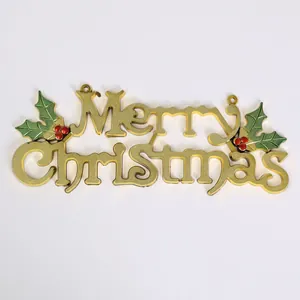 Gold electroplated Merry Christmas sign with holly leaf and berry accents for holiday decor