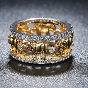 Elegant two-tone gold and silver elephant ring set with sparkling cubic zirconia stones