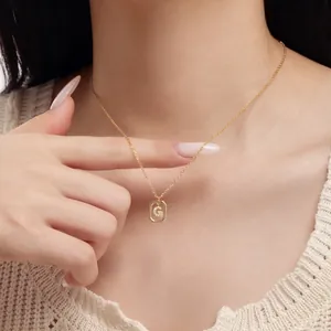 Elegant S925 sterling silver gold plated necklace featuring a sparkling initial G pendant.