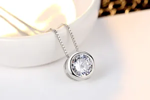 Macro view of the round AAA cubic zirconia pendant and silver box chain