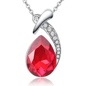 Elegant teardrop red crystal pendant necklace with sparkling white cubic zirconia.